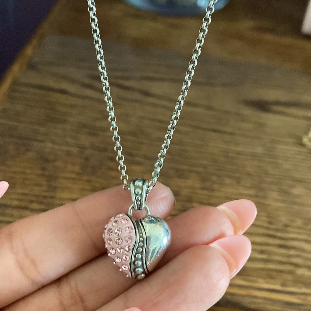 Heart pendant in chain.